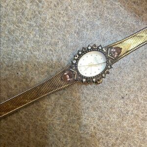 Gold and Silver Watch with Gem Accents